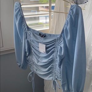 Blue ruched crop top